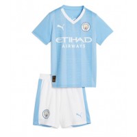 Camiseta Manchester City Primera Equipación Replica 2023-24 para niños mangas cortas (+ Pantalones cortos)